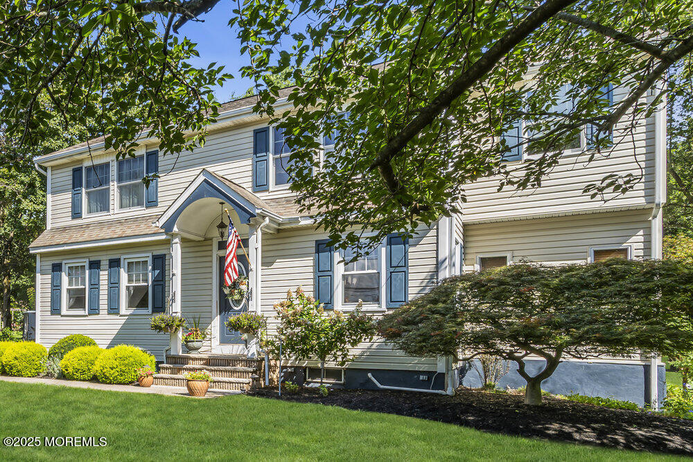 87 Amwell Road Hillsborough, NJ 08844 - Photo 3 of 46 a front view of a house with garden