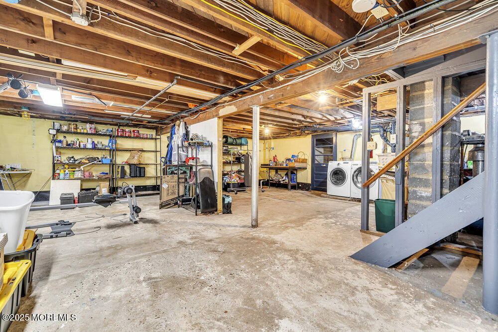 87 Amwell Road Hillsborough, NJ 08844 - Photo 31 of 46 a view of a garage with gym equipment