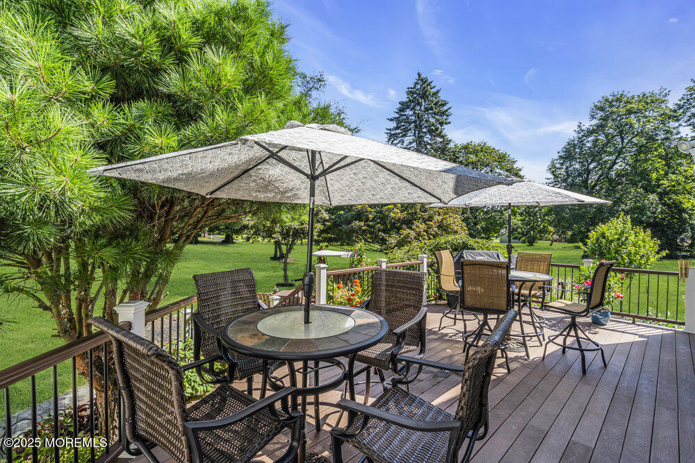 87 Amwell Road Hillsborough, NJ 08844 - Photo 35 of 46 a backyard of a house with wooden floor yard fire pit and patio