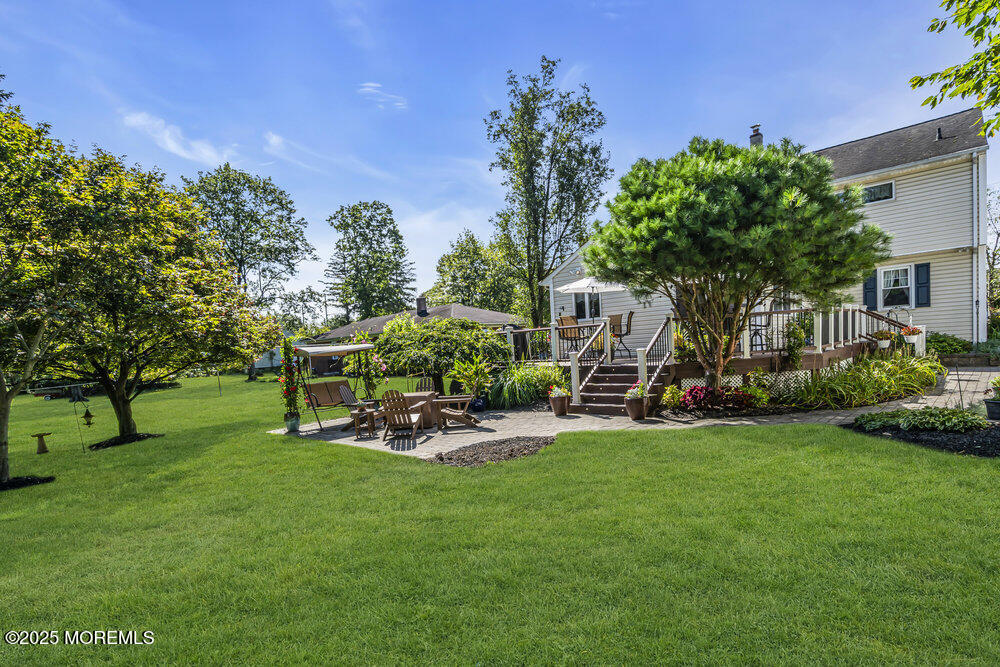 87 Amwell Road Hillsborough, NJ 08844 - Photo 39 of 46 a view of a chairs and table in a yard