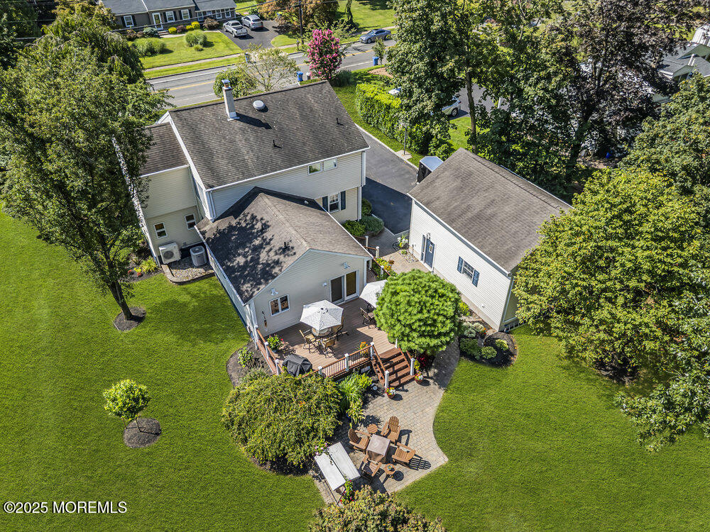 87 Amwell Road Hillsborough, NJ 08844 - Photo 40 of 46 an aerial view of a house with a garden