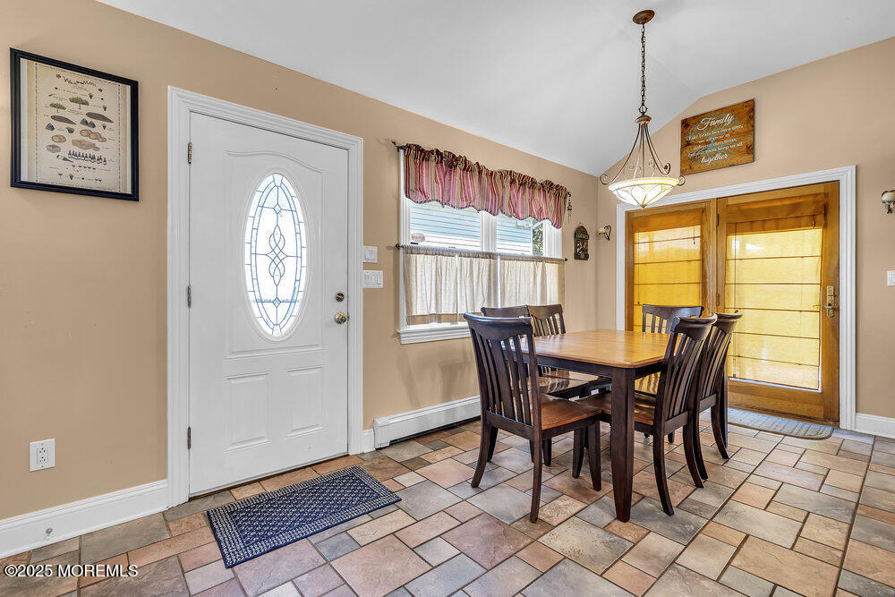 87 Amwell Road Hillsborough, NJ 08844 - Photo 9 of 46 a view of a dining room with furniture and a window