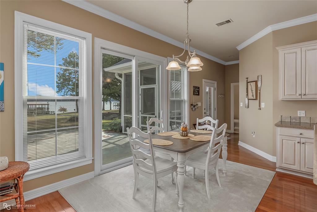 90 La Bella Court Many, LA 71449 - Photo 13 of 38 a dining room with furniture a chandelier and window