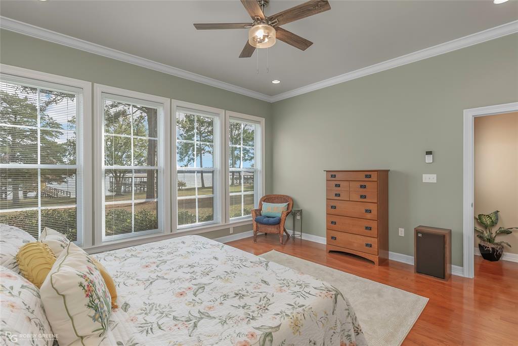 90 La Bella Court Many, LA 71449 - Photo 15 of 38 a bedroom with a bed and a large window