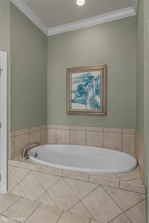 a bathroom with a tub and a shower