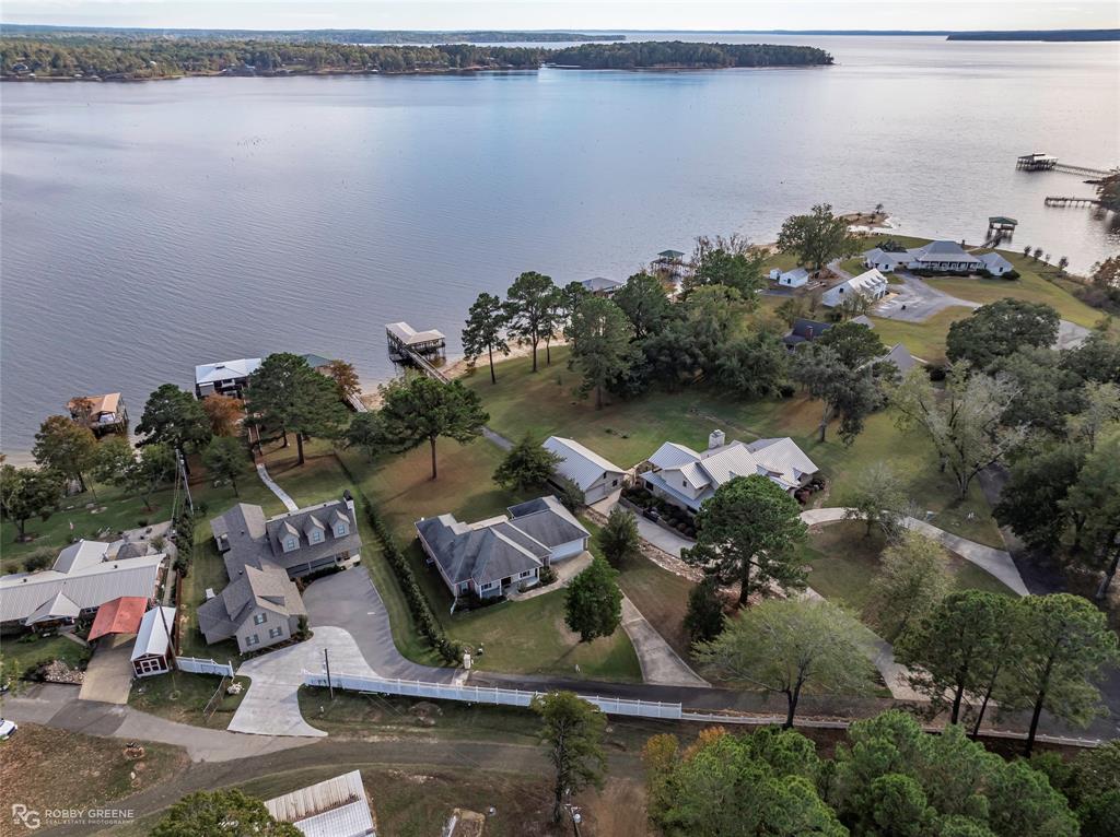 90 La Bella Court Many, LA 71449 - Photo 2 of 38 an aerial view of a house with a lake view