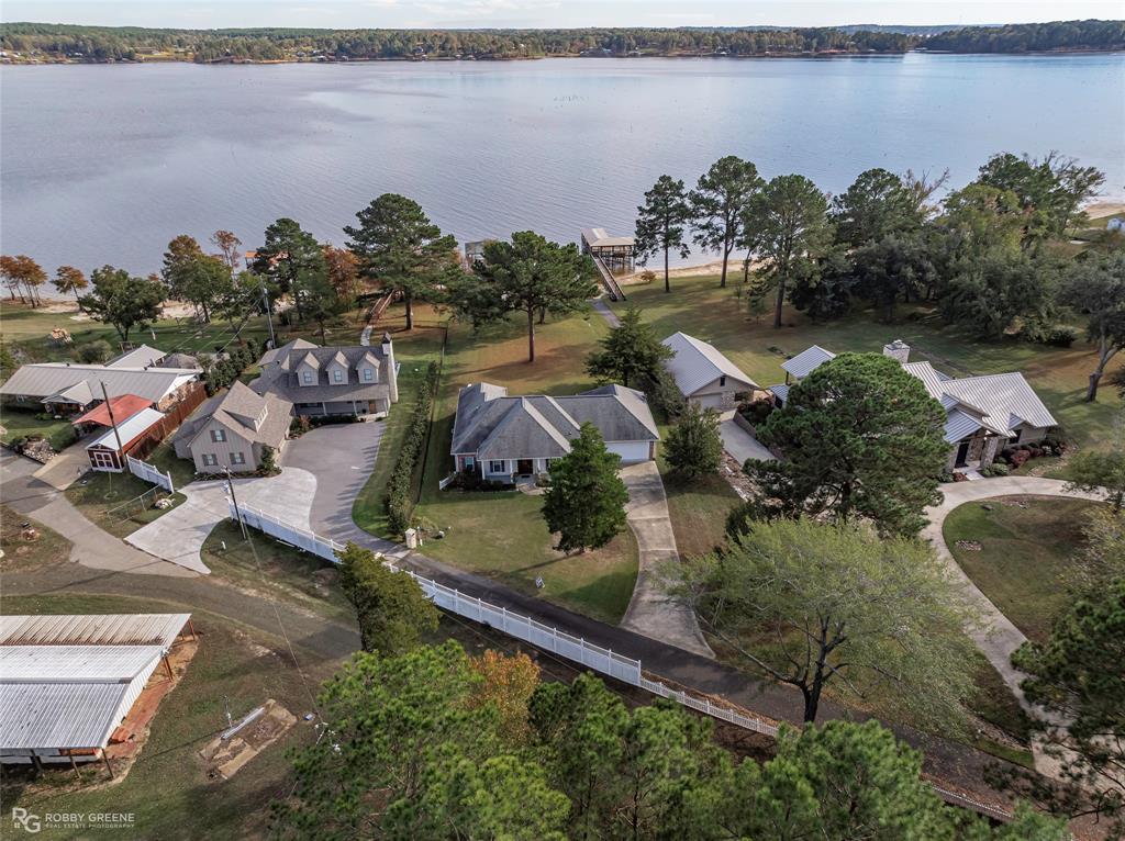 90 La Bella Court Many, LA 71449 - Photo 35 of 38 an aerial view of a house with a lake view