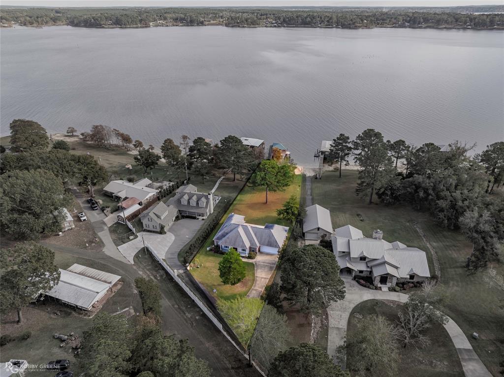 90 La Bella Court Many, LA 71449 - Photo 36 of 38 an aerial view of a house with a lake view
