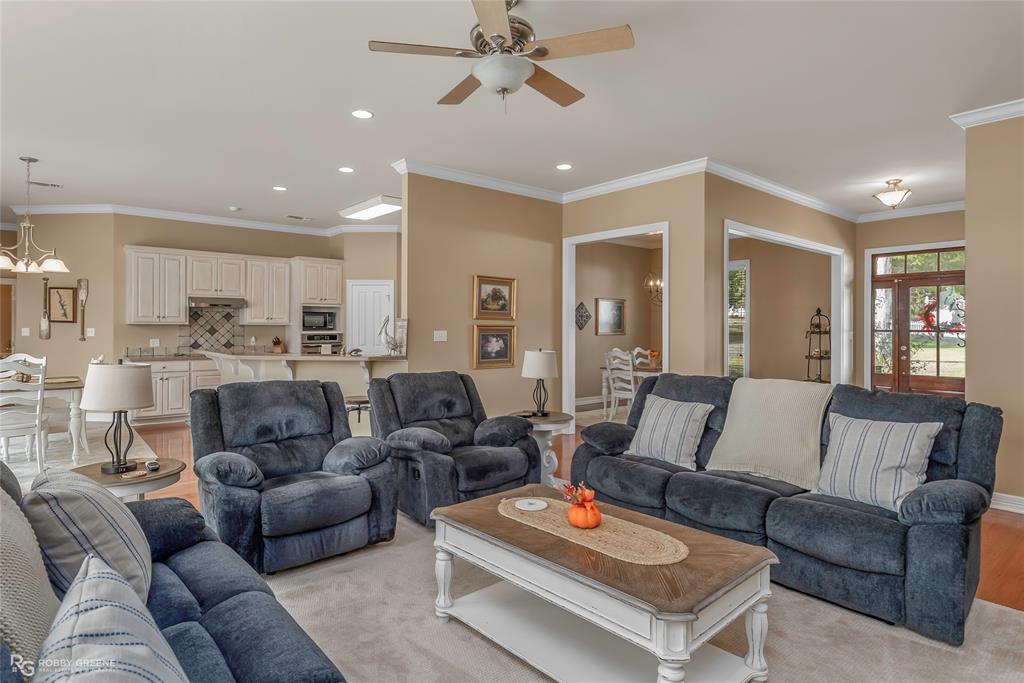 90 La Bella Court Many, LA 71449 - Photo 7 of 38 a living room with furniture kitchen view and a chandelier