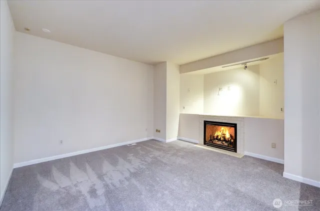a view of a livingroom with a fireplace