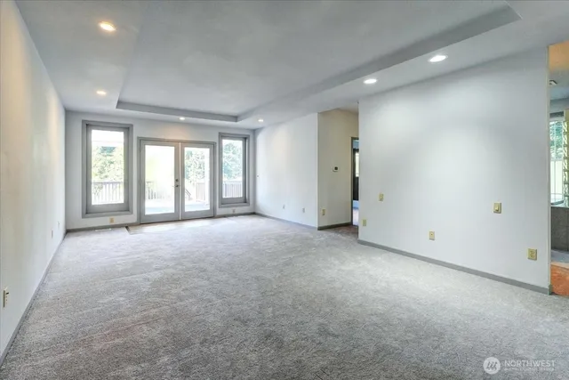 wooden floor and windows in an empty room