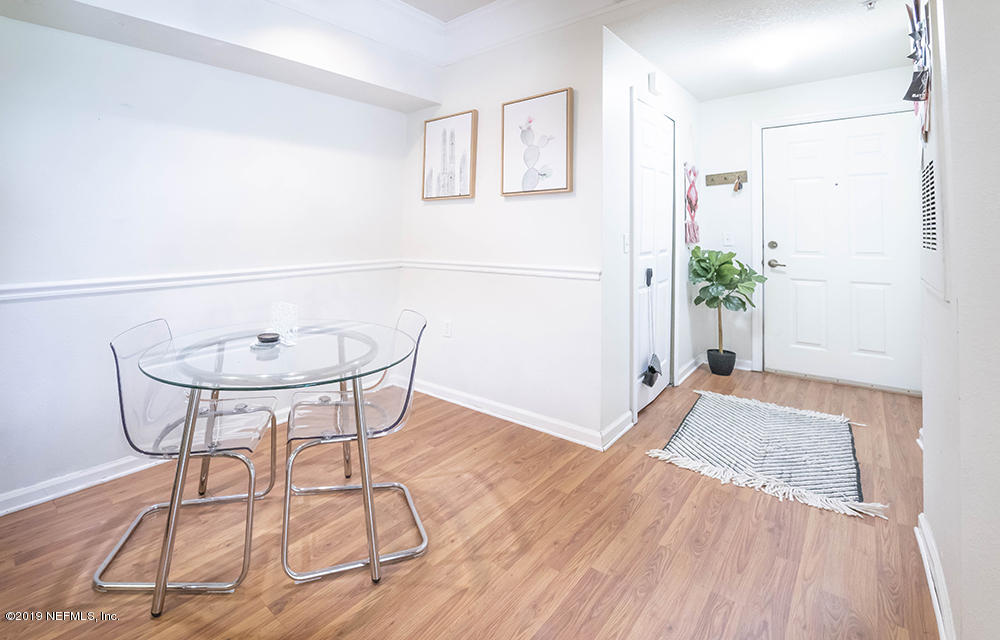 8550 Touchton Road, Unit 218 Jacksonville, FL 32216 - Photo 1 of 29 a view of a room with a table and chairs