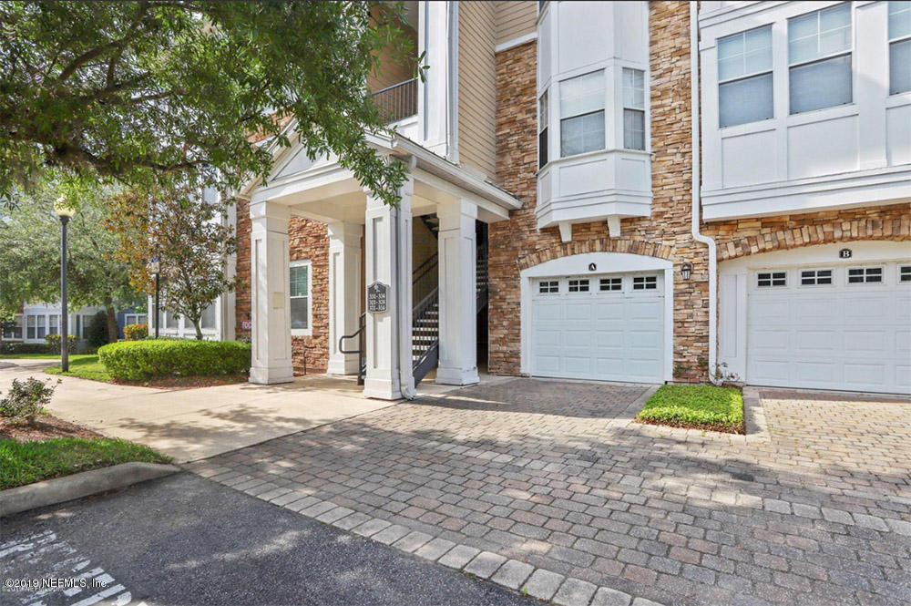 8550 Touchton Road, Unit 218 Jacksonville, FL 32216 - Photo 19 of 29 a view of a building along the street