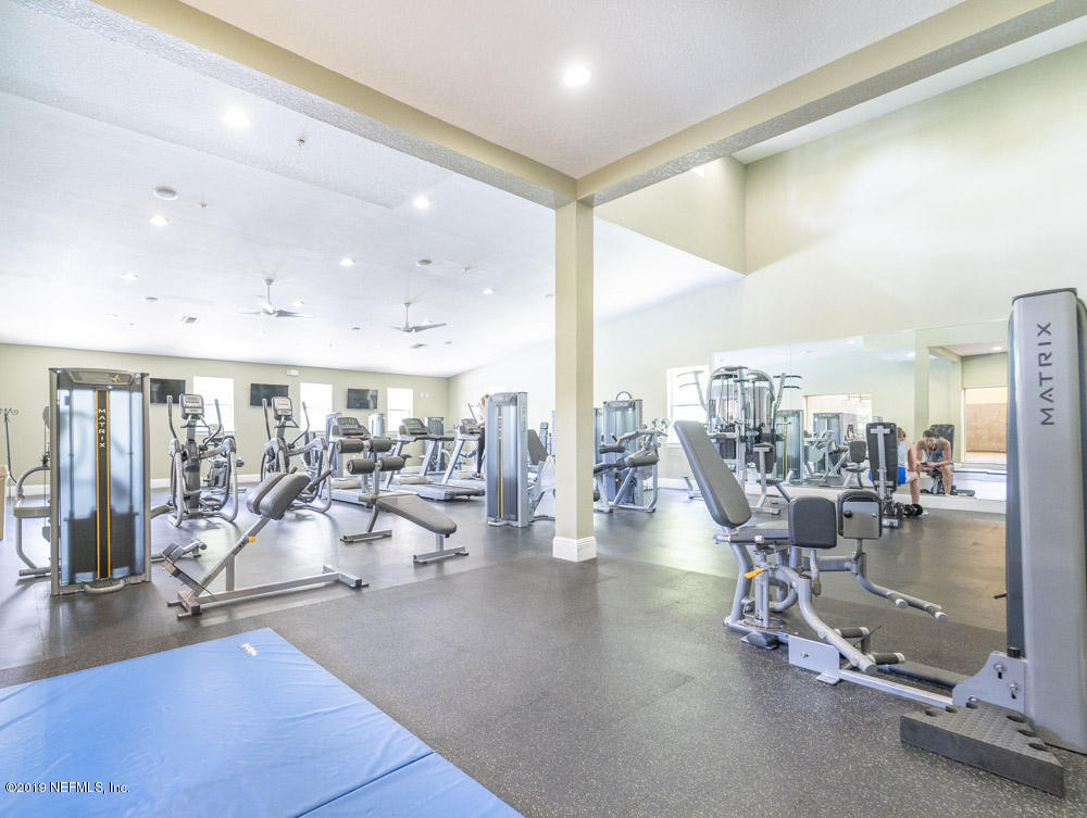 8550 Touchton Road, Unit 218 Jacksonville, FL 32216 - Photo 23 of 29 a view of a room with gym equipment