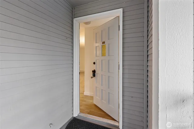 a view of a bathroom from a hallway