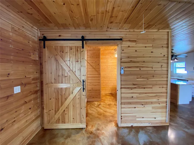 a view of entryway with wooden floor