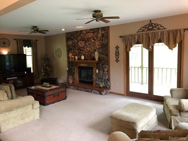 3250 Mason Road Howell, MI 48843 - Photo 9 of 50 step down family room with door wall to wrap around covered porch
