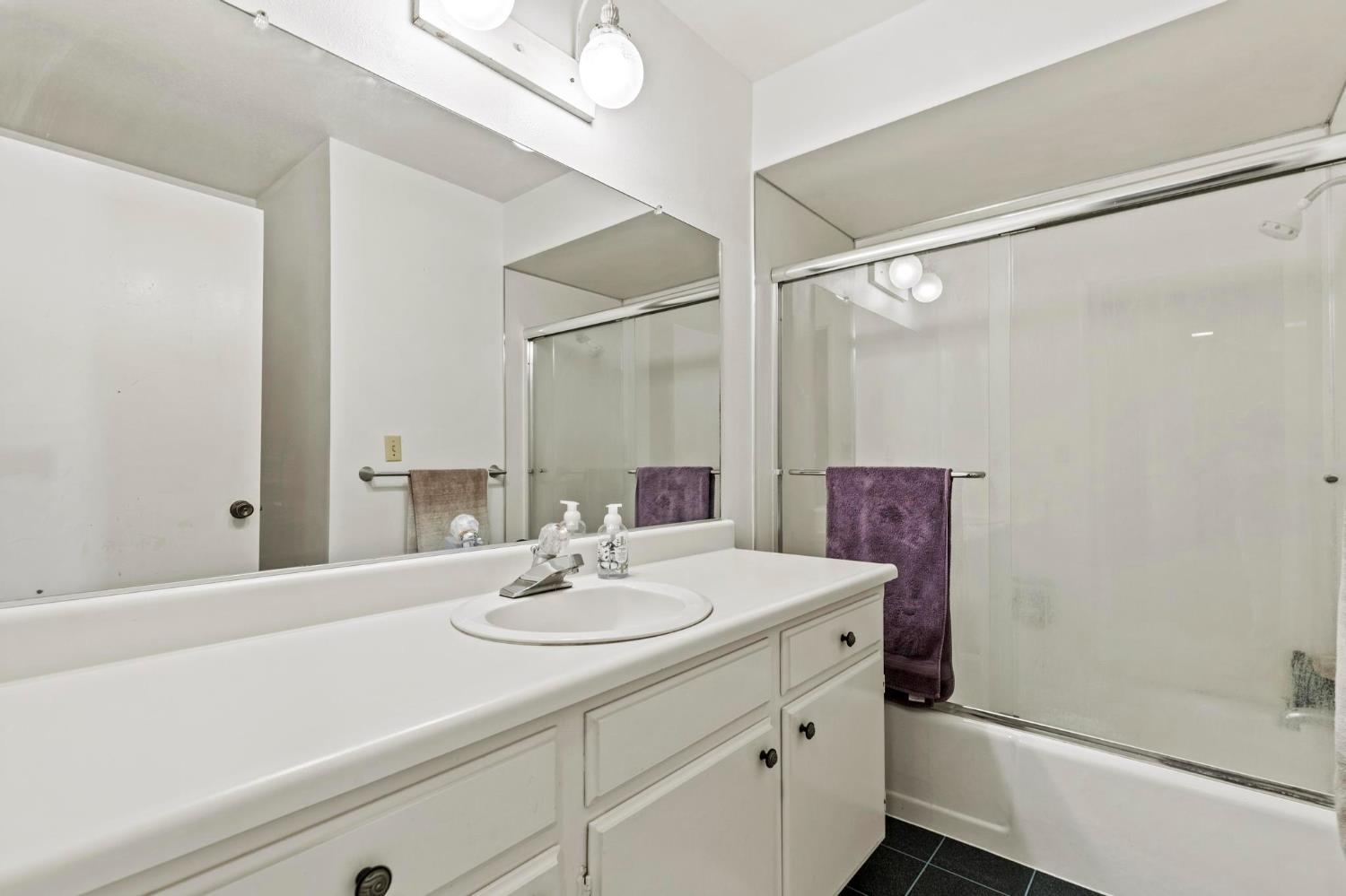 225 Elm Street Maxwell, CA 95955 - Photo 17 of 50 a bathroom with a sink and a mirror