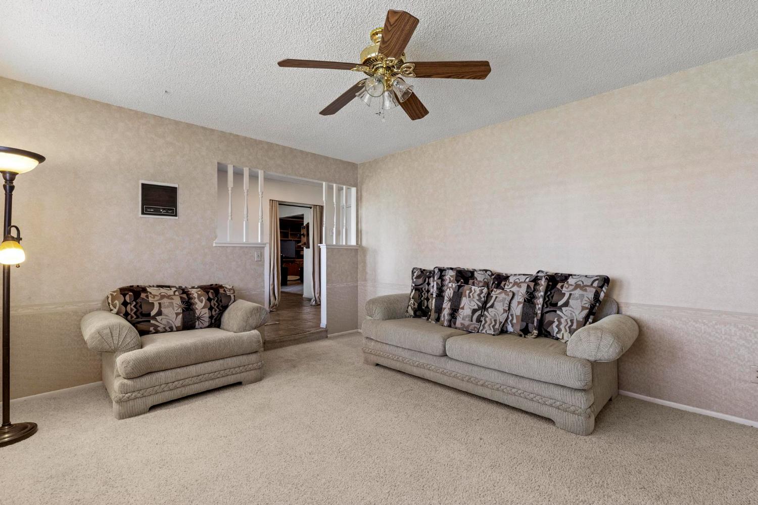 225 Elm Street Maxwell, CA 95955 - Photo 23 of 50 a living room with furniture and a couch