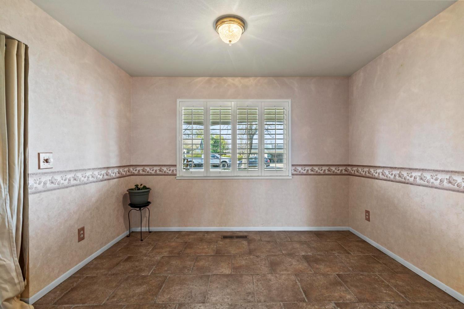 225 Elm Street Maxwell, CA 95955 - Photo 24 of 50 a view of an empty room with a window