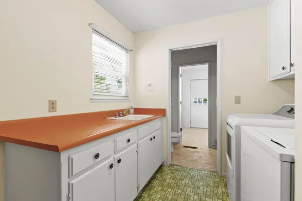 a room with a washer and dryer