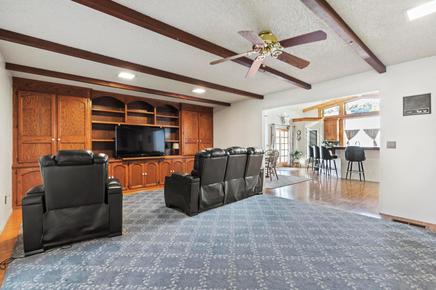 225 Elm Street Maxwell, CA 95955 - Photo 33 of 50 a living room with furniture and a flat screen tv