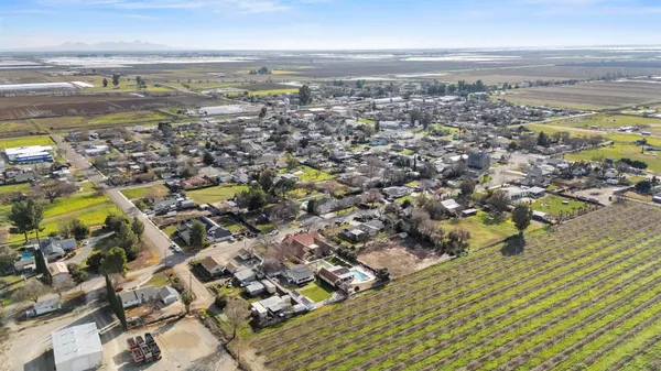 an aerial view of residential building with parking space