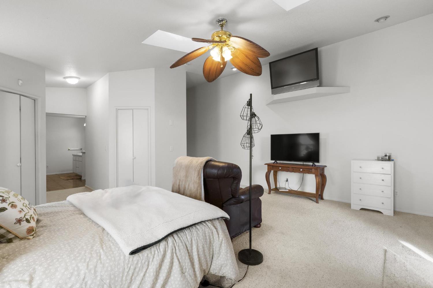 225 Elm Street Maxwell, CA 95955 - Photo 7 of 50 a bedroom with a bed and a television in it