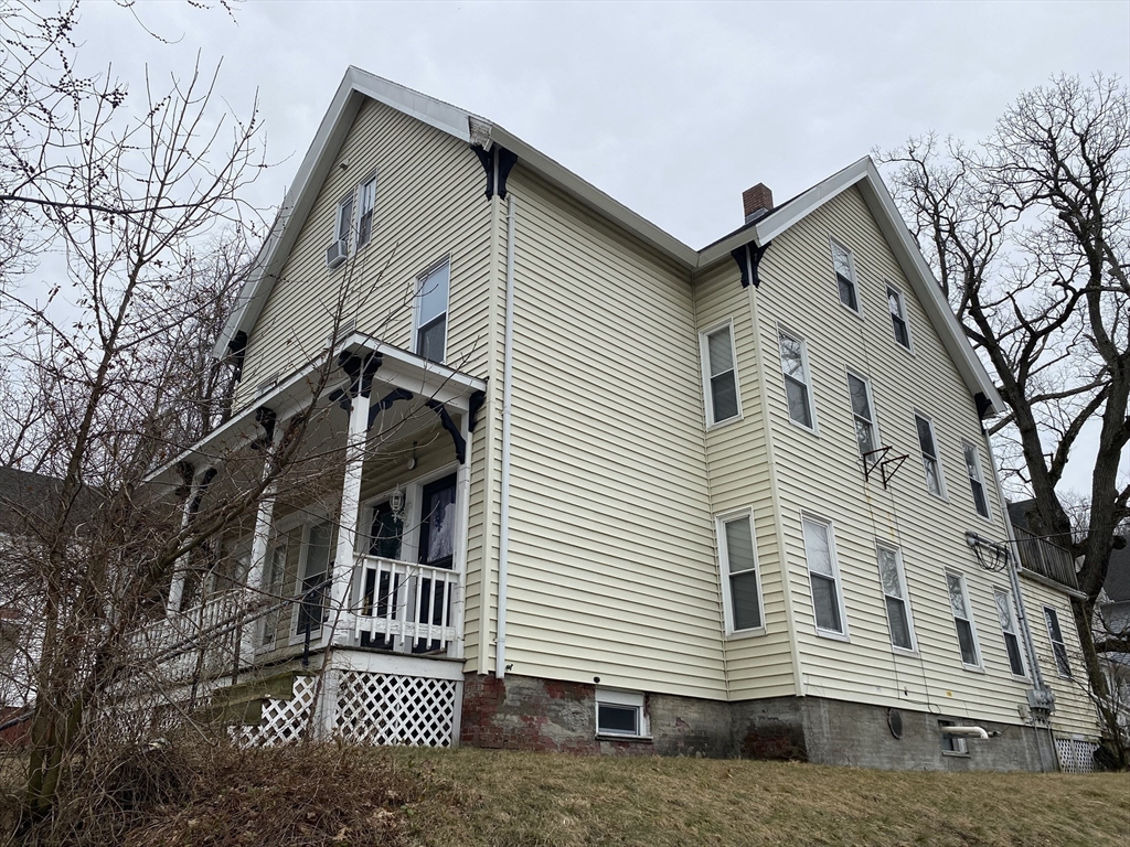 51 May Street Worcester, MA 01610 - Photo 2 of 23 a view of a house with a door