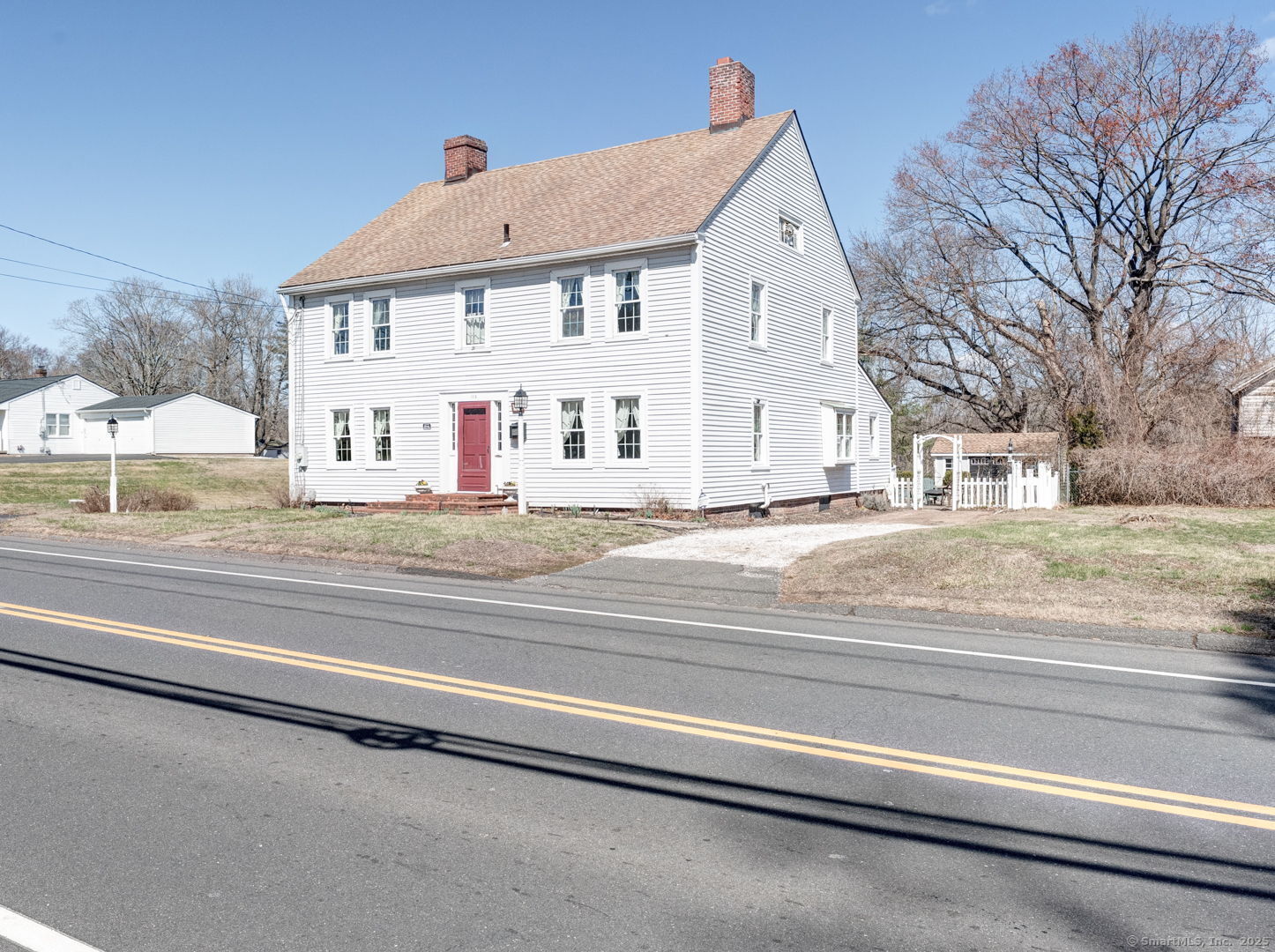 a view of a house with a street