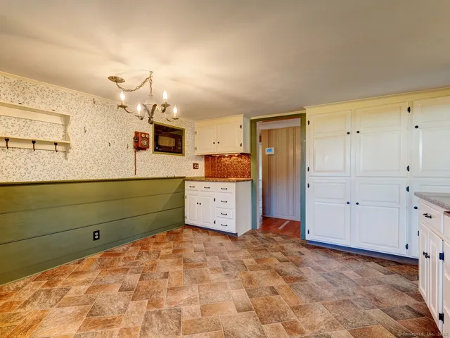 a room with closet and mirror