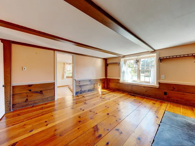 a view of an empty room and window