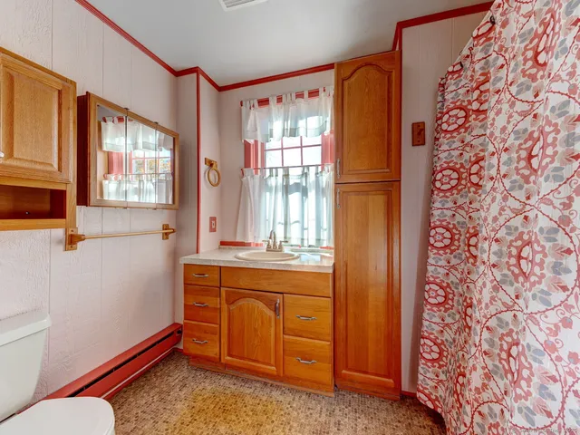a room with window and shower