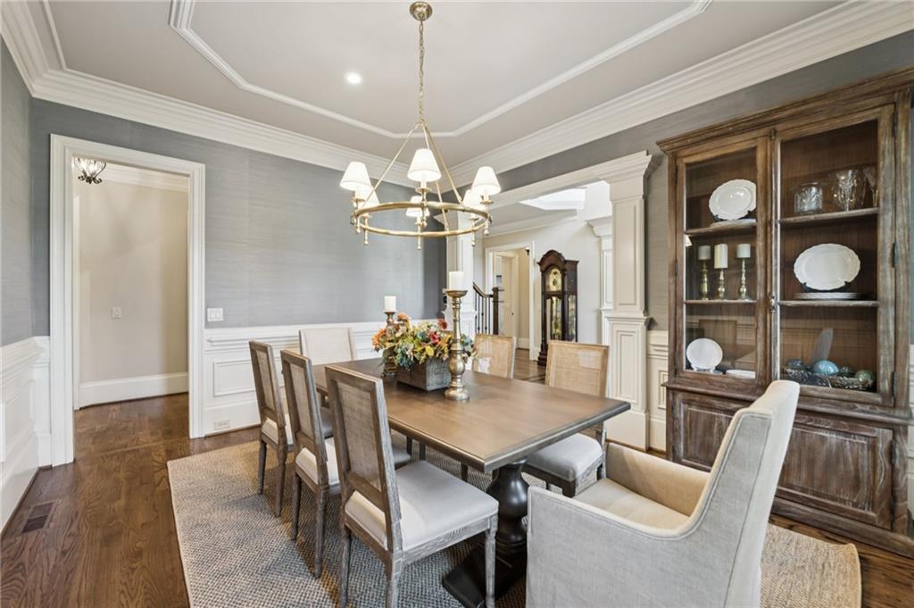 2071 Trimleston Road Statham, GA 30666 - Photo 11 of 96 a view of a dining room with furniture and chandelier