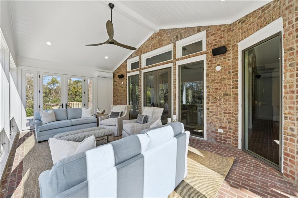 2071 Trimleston Road Statham, GA 30666 - Photo 19 of 96 a living room with furniture and large windows
