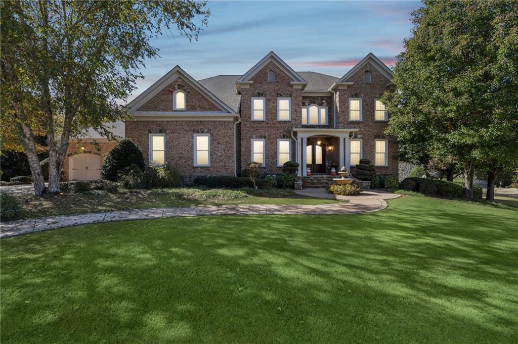 2071 Trimleston Road Statham, GA 30666 - Photo 2 of 96 a front view of a house with a yard