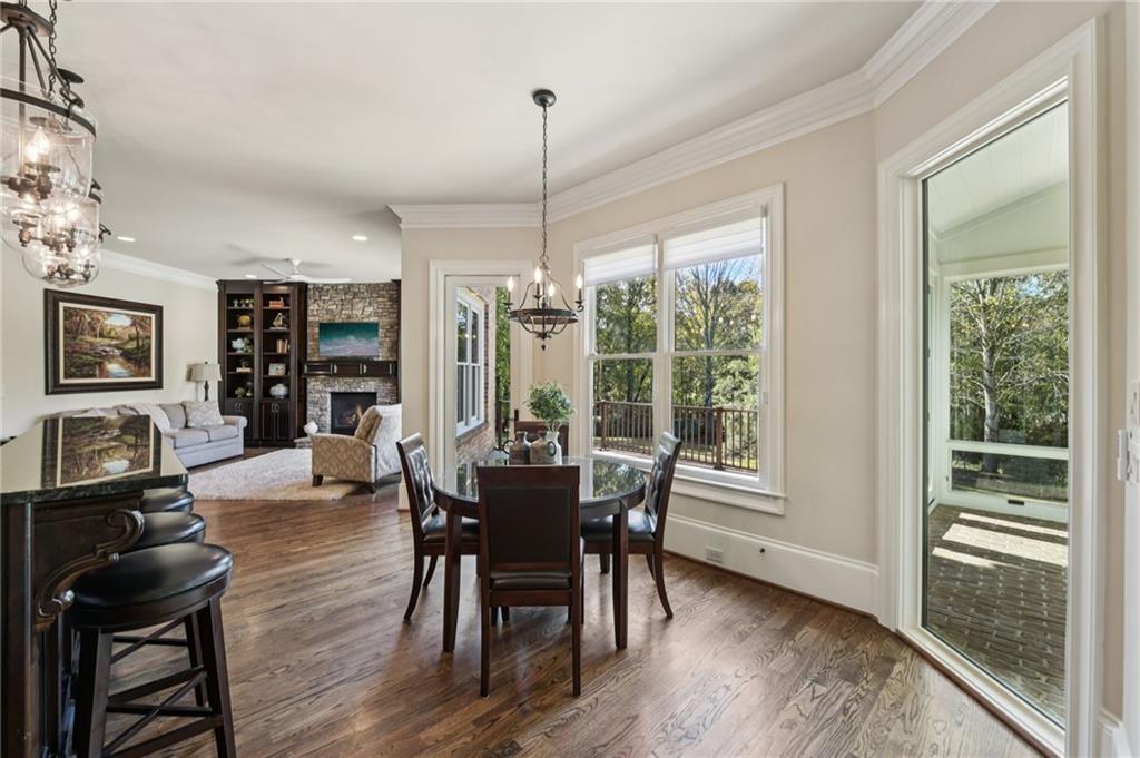 2071 Trimleston Road Statham, GA 30666 - Photo 29 of 96 a view of a dining room with furniture window and wooden floor