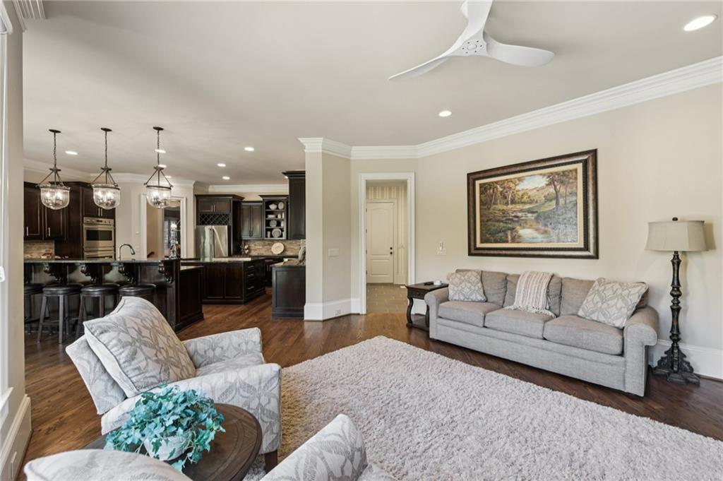 2071 Trimleston Road Statham, GA 30666 - Photo 32 of 96 a living room with furniture and a view of kitchen