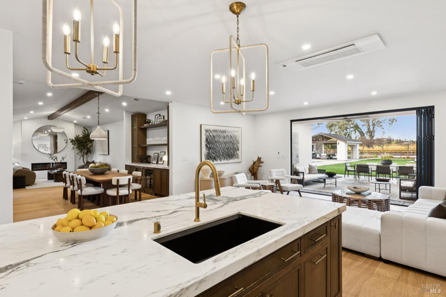1860 McKinley Road Napa, CA 94558 - Photo 29 of 89 a kitchen with stainless steel appliances kitchen island granite countertop a sink and a living room view