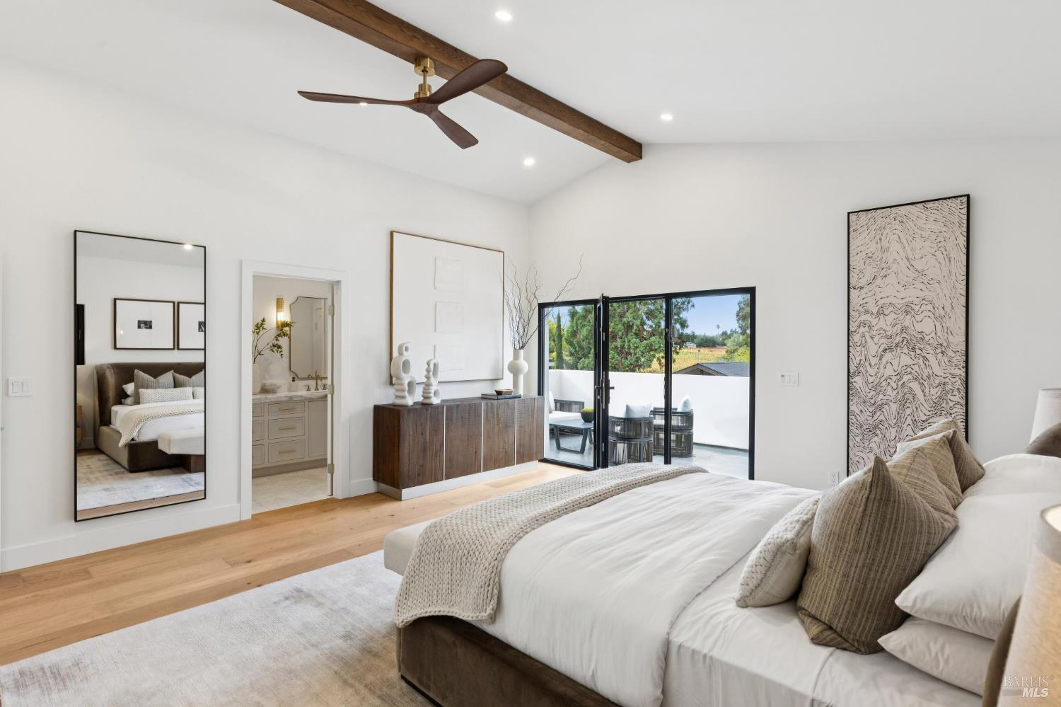 1860 McKinley Road Napa, CA 94558 - Photo 41 of 89 a bedroom with a large bed and a large window