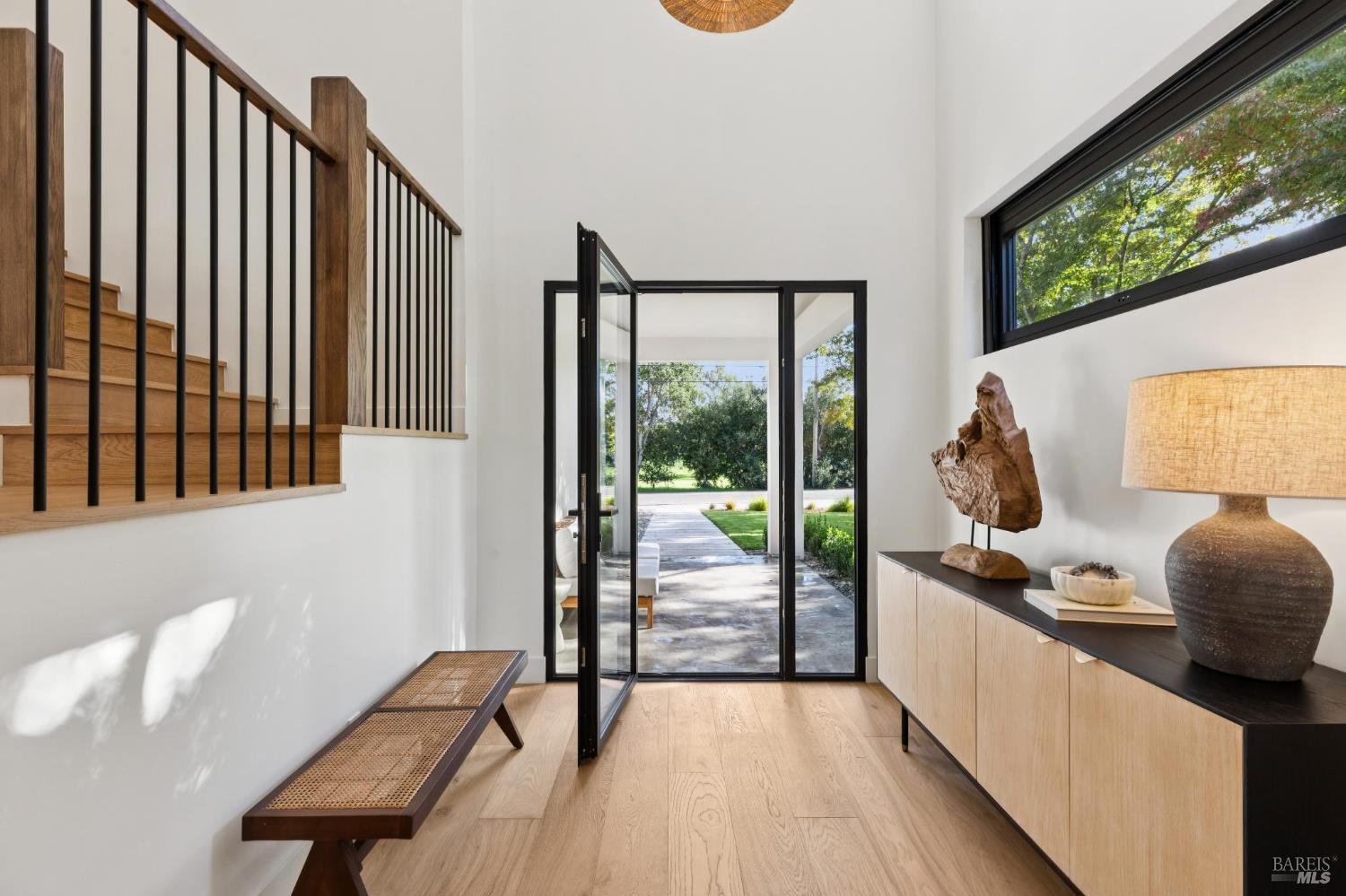 1860 McKinley Road Napa, CA 94558 - Photo 78 of 89 a view of a room with wooden floor and iron stairs
