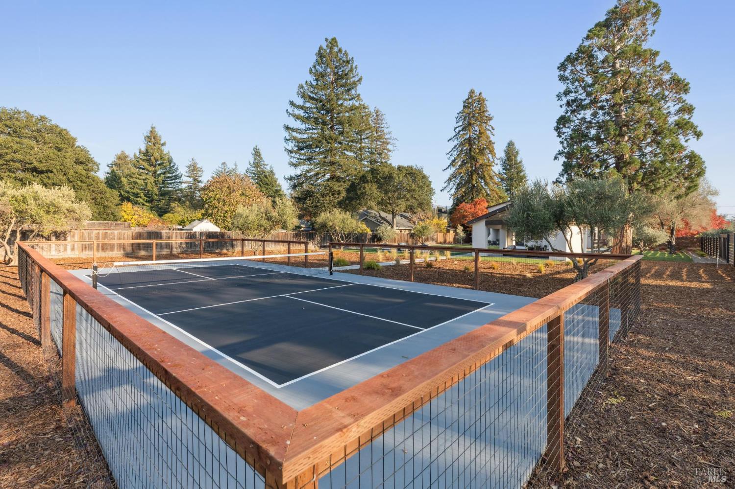 1860 McKinley Road Napa, CA 94558 - Photo 82 of 89 a view of swimming pool with outdoor seating and trees in the background