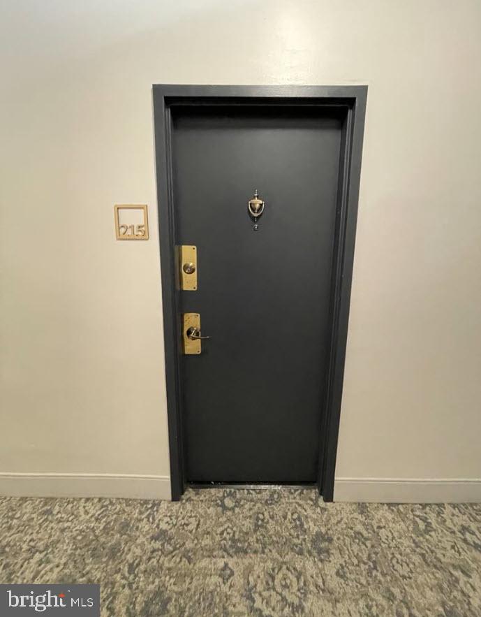 1669 Columbia Road Northwest, Unit 215 Washington, DC 20009 - Photo 8 of 28 a view of a hallway