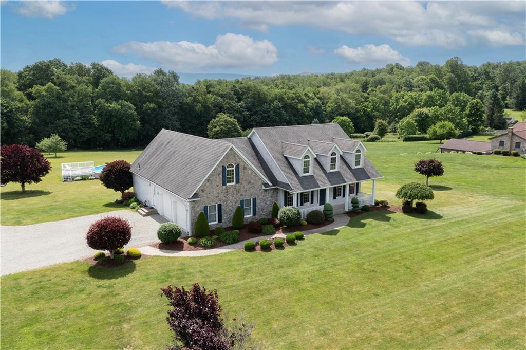 290 Hellein School Road Acme, PA 15610 - Photo 23 of 25 an aerial view of a house with yard swimming pool and outdoor seating