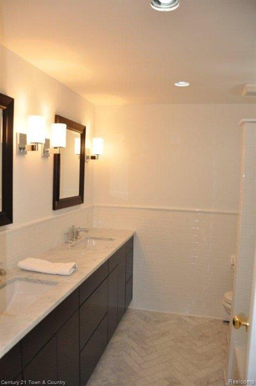 6026 Deguise Court Rochester, MI 48306 - Photo 17 of 25 marble floor & countertop