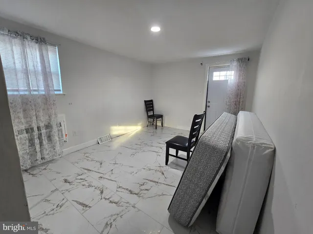 a view of a hallway with workspace