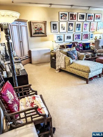 a kitchen with granite countertop a sink and cabinets