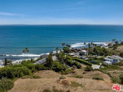 a view of a lake and mountain