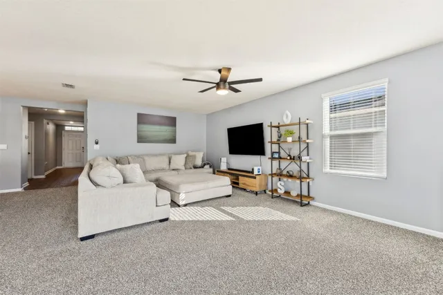 a view of a garage with rack and bicycle