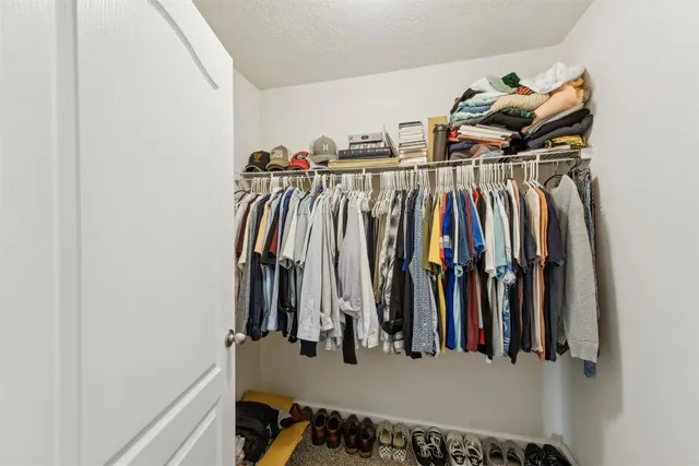 a living room with furniture fireplace and flat screen tv